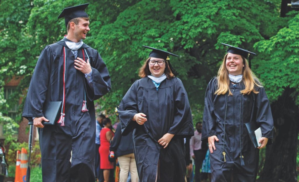 students in cap and gowns
